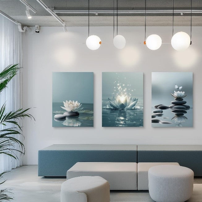 Modern living room with a triptych wall art of lotus flowers and stones.